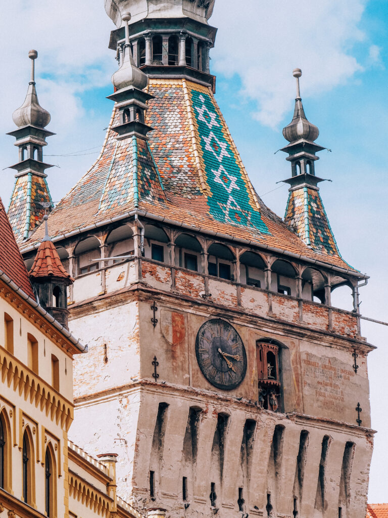 church tower with colourful tiles in sigisoara