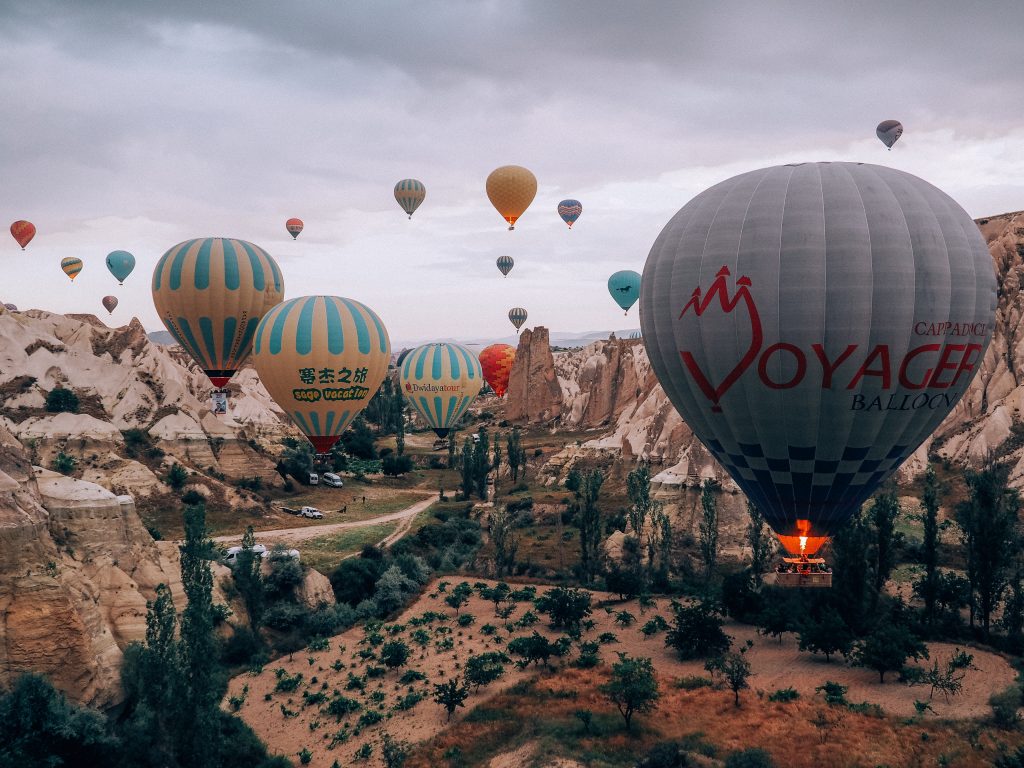 hot air balloons flying over cappadocia